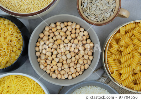 Chickpeas in bowl. Various vegetarian organic products. Vintage view. Top view. 97704556