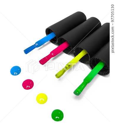Four multi-colored nail polishes on a white background. Color drops. Nail Salon 97705130