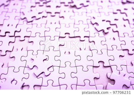 Background texture of disjointed jigsaw puzzles, a clear and faded pink color 97706231