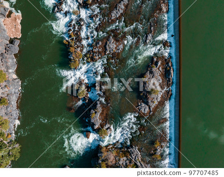 Aerial panoramic view of the waterfall in city of Idaho Falls, ID, USA. Aerial panoramic view of the waterfall in city of Idaho Falls, ID, USA. 97707485