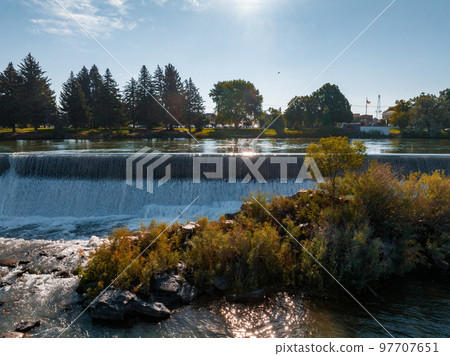 Aerial panoramic view of the waterfall in city of Idaho Falls, ID, USA. 97707651