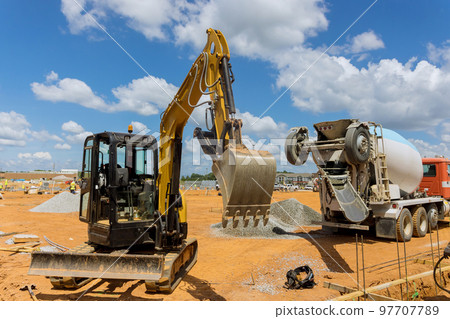 In construction site is being worked with heavy construction equipment 97707789