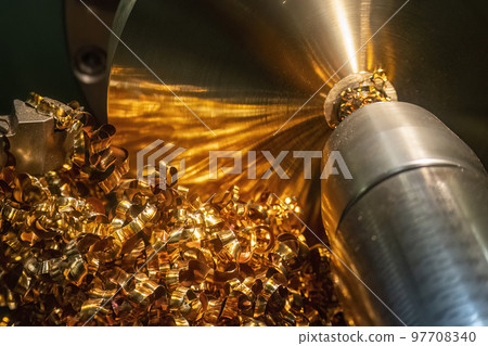 Close-up scene of brass materials scrap from turning process. Close-up scene of brass materials scrap from turning process. 97708340
