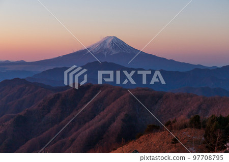 Mt.Fuji and frost-covered trees dyed in the light of dawn from the summit of Shiratani no Maru in winter Mt.Fuji and frost-covered trees dyed in the light of dawn from the summit of Shiratani no Maru in winter 97708795