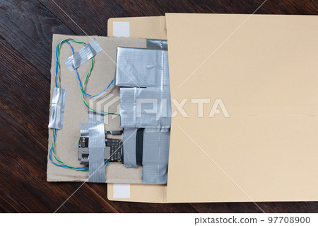 Mail bomb IED - Improvised Explosive Device with c4 and cell phone module in envelope 97708900