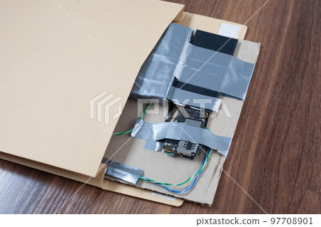 Mail bomb IED - Improvised Explosive Device with c4 and cell phone module in envelope Mail bomb IED - Improvised Explosive Device with c4 and cell phone module in envelope 97708901