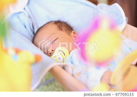 2 months old baby sleeping with a pacifier 2 months old baby sleeping with a pacifier 97709133