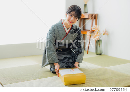 A Japanese-style room with a black tie-dye A Japanese-style room with a black tie-dye 97709564