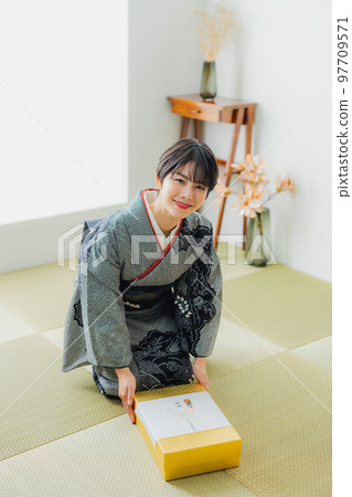 A Japanese-style room with a black tie-dye A Japanese-style room with a black tie-dye 97709571