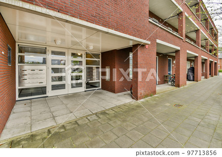 View of street near building with beauty of vagitaion outside 97713856