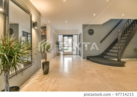 Interior of contemporary flat in modern style with spacious hallway with white walls 97714215