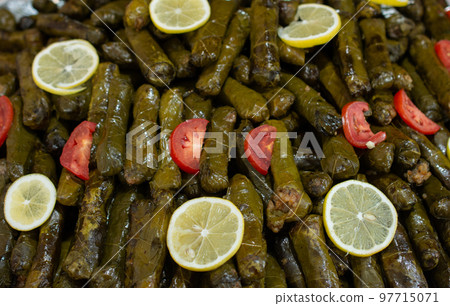 Stuffed grape leaves stuffed grape leaves with rice in Turkish style Stuffed grape leaves stuffed grape leaves with rice in Turkish style 97715071