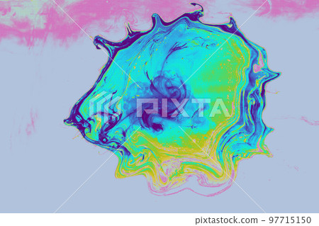 Paint dissolve swirling in water forming colorful background 97715150