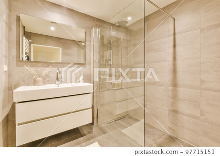 a bathroom that is very clean and ready to use as a shower stall or room divider for the toilet 97715151