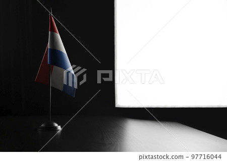 Small national flag of the Paraguay on a black background Small national flag of the Paraguay on a black background 97716044