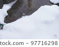A picture of melting the accumulated snow with a snow melting device A picture of melting the accumulated snow with a snow melting device 97716298