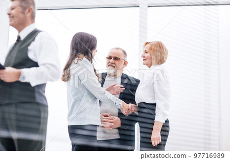 business people shaking hands when meeting in the office. 97716989