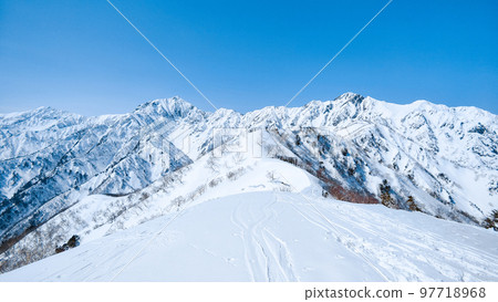 Winter Tomi Ridge Trekking: View of Mt. Kashimayarigatake and Mt. Goryu from the summit of Mt. Kotomi Winter Tomi Ridge Trekking: View of Mt. Kashimayarigatake and Mt. Goryu from the summit of Mt. Kotomi 97718968