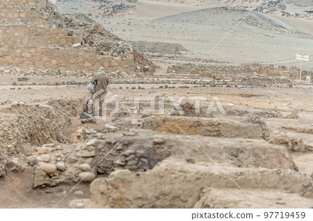 digging up the remains of an old civilization in the desert digging up the remains of an old civilization in the desert 97719459