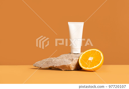Front view mockup scene with unbranded white cosmetic tube on stone podium. Lotion, cream, hand cream, sunscreen, moisturizer template. 97720107