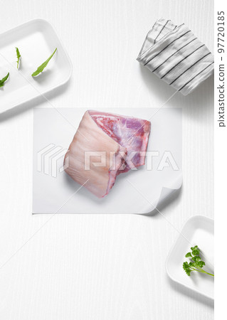 Pork belly on a kitchen with some herbs Pork belly on a kitchen with some herbs 97720185