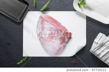 Pork ham on a flat lay of a kitchen with various items 97720222
