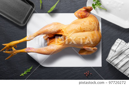 camper chicken on a flat lay of a kitchen with various items 97720272