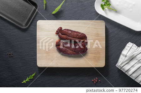 Spanish onion chorizo on a flat lay of a kitchen with various items 97720274