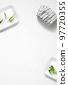 Flat lay of a kitchen with containers and herbs 97720355