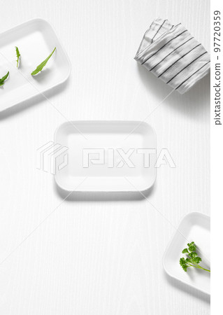 Flat lay of a kitchen with styrofoam containers and herbs Flat lay of a kitchen with styrofoam containers and herbs 97720359