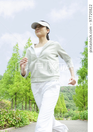 A woman who jogs A woman who jogs 97720822