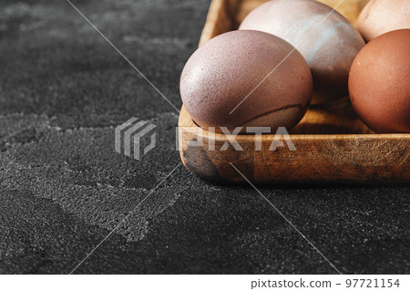 Easter eggs on a dark background 97721154