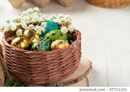Many Easter eggs decorated with floral branches 97721201