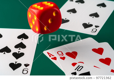 Playing cards with red dice. Casino and gambling concept Playing cards with red dice. Casino and gambling concept 97721362