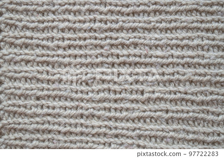 Handmade knitted background with macro woven threads. Handmade knitted background with macro woven threads. 97722283