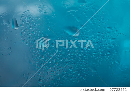 Drops of rain on glass 97722351
