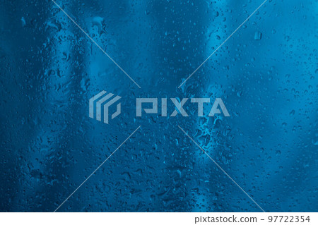 Drops of rain water droplets on glass Drops of rain water droplets on glass 97722354