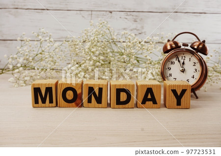 monday alphabet letters on wooden background 97723531