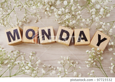 monday alphabet letters on wooden background 97723532