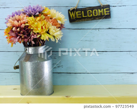 welcome sign and flower bouquet with space copy background welcome sign and flower bouquet with space copy background 97723549