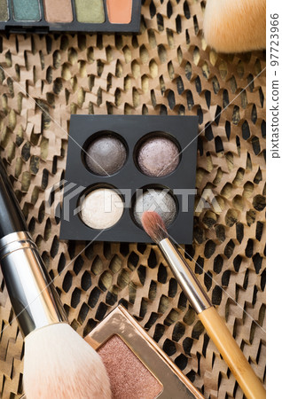 fashion set of new cosmetics palettes with  brushes. close up 97723966
