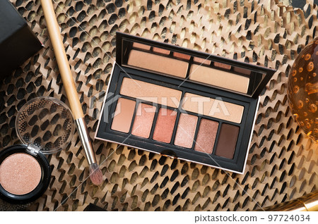 fashion set of new cosmetics eyeshadows palettes with brushes. close up 97724034