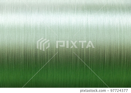 Closed up of green color of thread textured background (Focus at center of picture) Closed up of green color of thread textured background (Focus at center of picture) 97724377