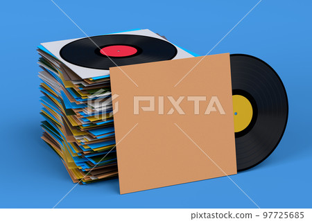 Set of Hi-fi speakers and DJ turntable with vinyl LP record on heap of covers 97725685