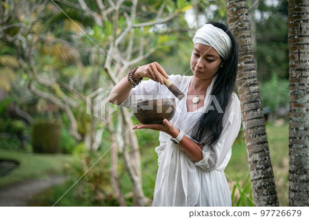Girl practice yoga meditation outdoor in park Girl practice yoga meditation outdoor in park 97726679