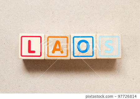 Color letter block in word laos on wood background Color letter block in word laos on wood background 97726814