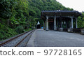 New Athos, Abkhazia, Georgia - June, 2022. View of the building and the tracks of the Psyrtskha railway station in New Athos. 97728165