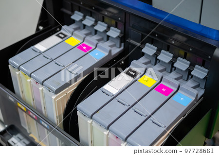 Row of inkjet printer CMYK cartridges - close up Row of inkjet printer CMYK cartridges - close up 97728681