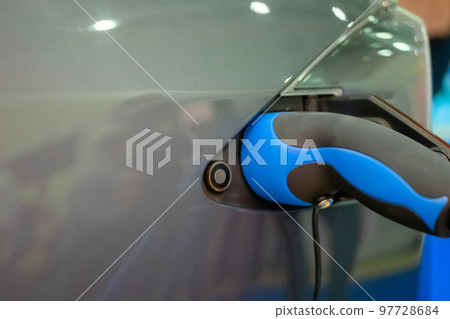 Electric charger of vehicle charging station with plug of power cable Electric charger of vehicle charging station with plug of power cable 97728684