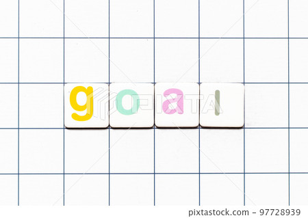 Colorful tile letter in word goal on white grid background Colorful tile letter in word goal on white grid background 97728939